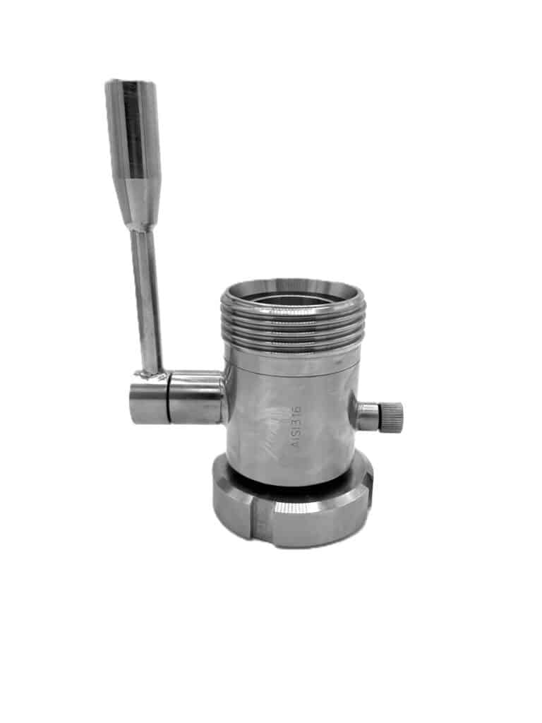 Vanne d'échantillonnage manuelle en acier inoxydable AISI 316, avec poignée, raccord fileté supérieur et purge latérale.